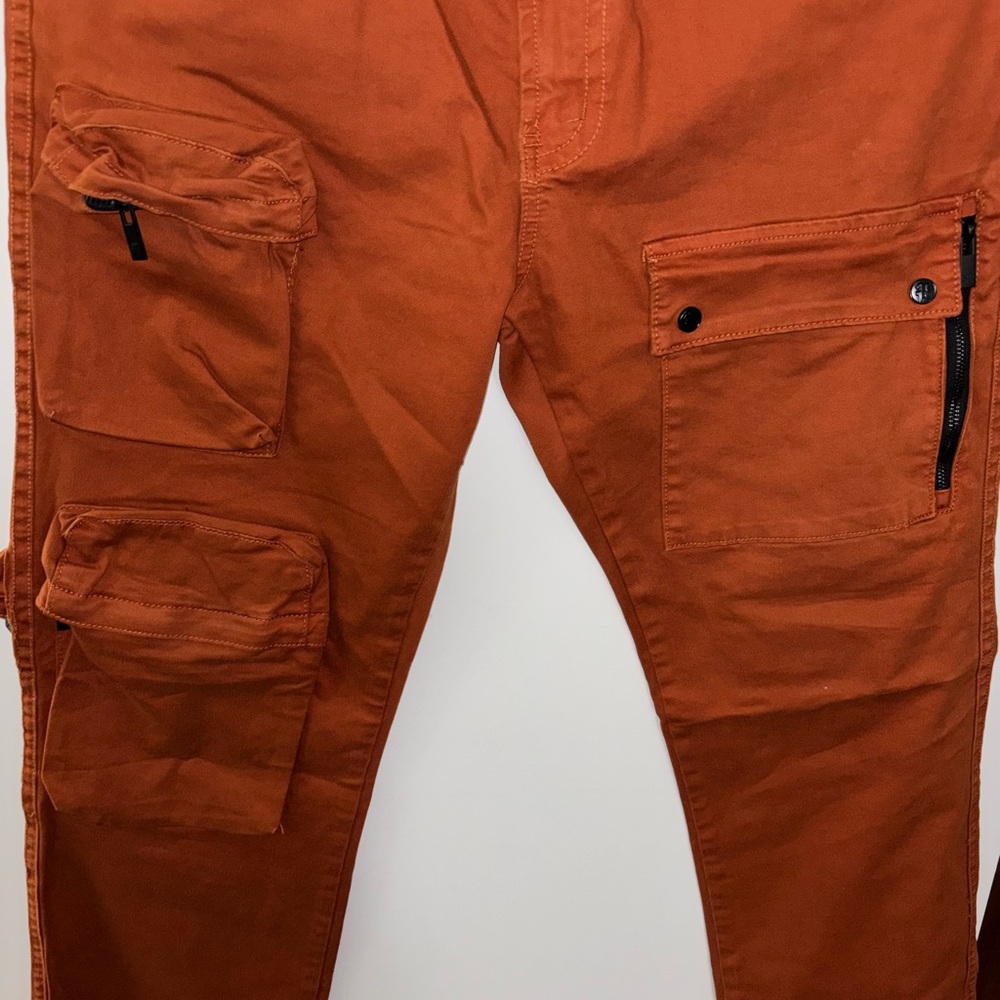 Men's Bootcut Jeans in Rust by [Brand]